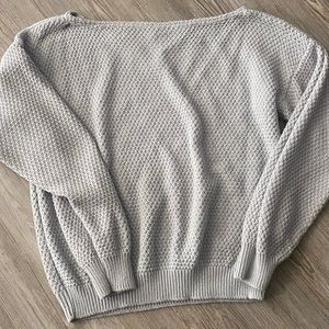 Gray off shoulder sweater.